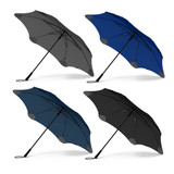 A set of four BLUNT Exec Umbrellas in grey, blue, teal, and black, each with a logo on the canopy. A set of four BLUNT Exec Umbrellas in grey, blue, teal, and black, each with a logo on the canopy.