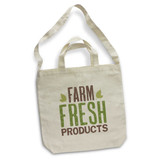 A cream cotton shoulder tote bag with long handles and a logo featuring "Farm Fresh Products" in green and brown text. A cream cotton shoulder tote bag with long handles and a logo featuring "Farm Fresh Products" in green and brown text.
