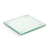 A square glass coaster in clear colour with rounded corners and small raised dots on each corner. A square glass coaster in clear colour with rounded corners and small raised dots on each corner.