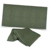 A green bath towel and a matching hand towel, featuring a ribbed texture, with a logo present. A green bath towel and a matching hand towel, featuring a ribbed texture, with a logo present.