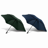 Two BLUNT Sport Umbrellas in dark green and navy blue, featuring a sleek design and a logo.
