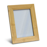 A NATURA wooden photo frame in a natural bamboo finish, designed to hold photos in a vertical orientation. A NATURA wooden photo frame in a natural bamboo finish, designed to hold photos in a vertical orientation.
