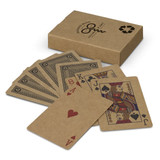 Kraft Playing Cards in a cardboard box, featuring a brown and black design. Cards display various playing card symbols.