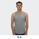 A man wearing a light grey tank top. The tank has a simple design and features a logo.