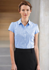 A blue and white striped short sleeve button-up shirt for women, featuring a collar and a logo. A blue and white striped short sleeve button-up shirt for women, featuring a collar and a logo.