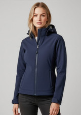 A navy soft shell jacket with a hood, featuring a zip closure and side pockets. The model is wearing it.