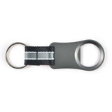 A drink bottle opener keyring in grey with a black and white fabric loop, featuring a logo. A drink bottle opener keyring in grey with a black and white fabric loop, featuring a logo.