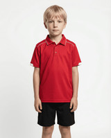 A red polo shirt for kids with contrasting stripes, displayed on a child wearing black shorts. It features a logo.