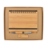 A bamboo notebook with a spiral binding, a pen, and an eraser, all presented in a cardboard gift box. A bamboo notebook with a spiral binding, a pen, and an eraser, all presented in a cardboard gift box.