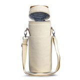 A cream cooler bag with a removable lid, featuring a shoulder strap and an inner lining for insulation. A cream cooler bag with a removable lid, featuring a shoulder strap and an inner lining for insulation.
