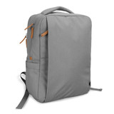 A grey backpack with orange zipper pulls, featuring a front pocket and padded shoulder straps. It has a logo visible.