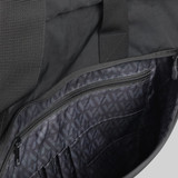 An interior view of a black laptop bag featuring multiple pockets and a textured lining. An interior view of a black laptop bag featuring multiple pockets and a textured lining.