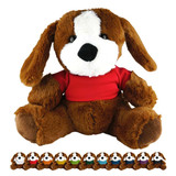 A brown plush dog with a white snout and black eyes, wearing a red shirt, seated against a white background.