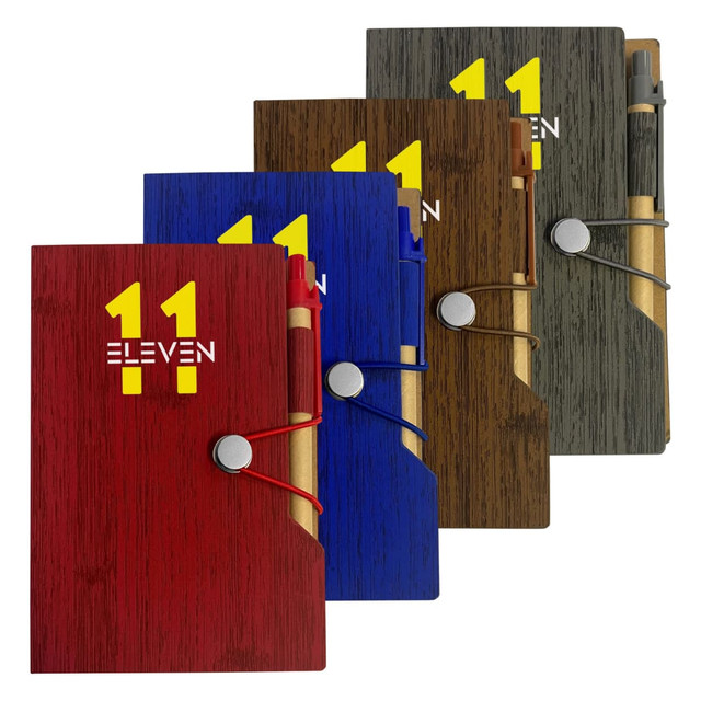 A collection of four wooden-pattern sticky note pads in red, blue, green, and brown, each with a pen and a logo.