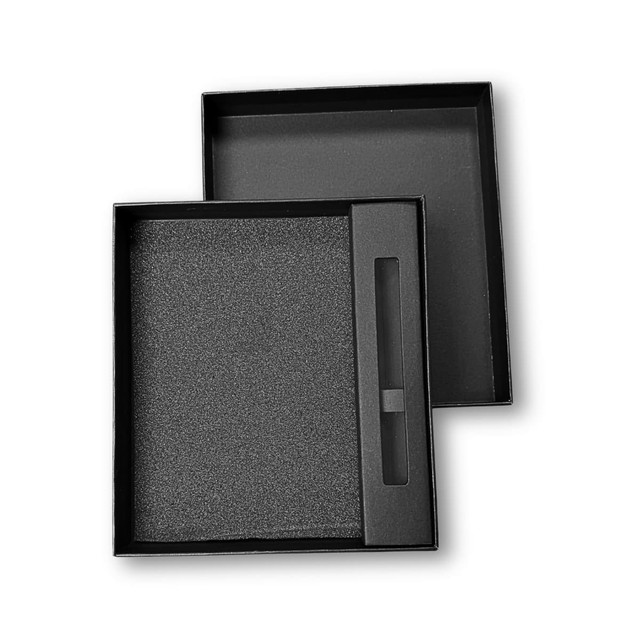 A black gift box with a textured inner compartment and a removable top, featuring a slot for contents.