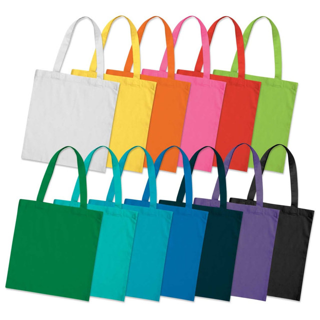 A collection of colourful cotton tote bags in various shades, including white, yellow, pink, green, and black, with handles.