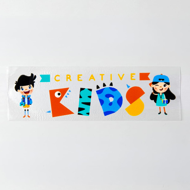A vibrant sticker featuring two cartoon characters and colourful text that reads "CREATIVE KIDS" in a playful design.