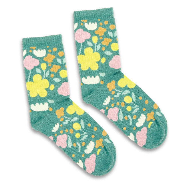 A pair of teal knitted socks featuring a floral pattern in yellow, pink, white, and orange colours.
