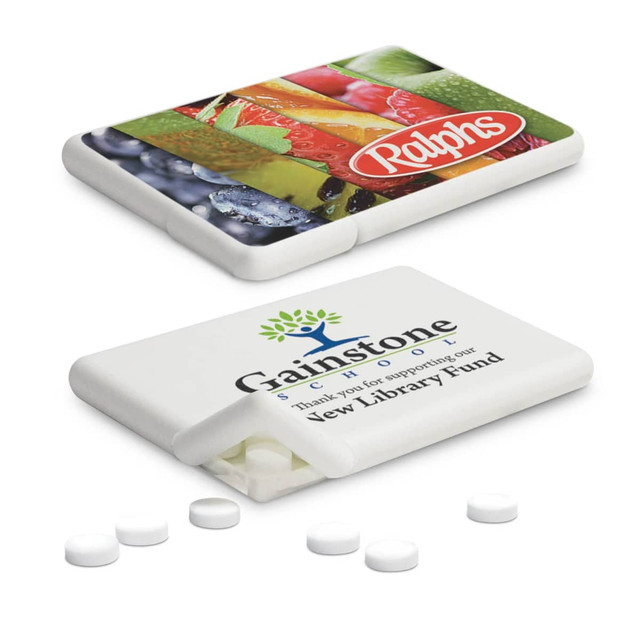 A mint card featuring a colourful fruit design with an open case and white mints inside. It has a logo on one side. A mint card featuring a colourful fruit design with an open case and white mints inside. It has a logo on one side.