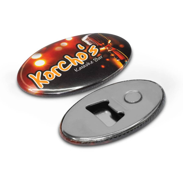 A drink bottle opener in oval shape with a metallic finish, featuring a logo and a black backing. A drink bottle opener in oval shape with a metallic finish, featuring a logo and a black backing.