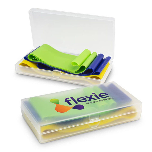 A transparent storage box containing green and blue resistance exercise bands, with a logo on the front. A transparent storage box containing green and blue resistance exercise bands, with a logo on the front.