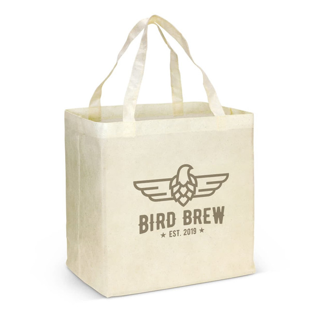 A natural-coloured tote bag with two handles and a logo featuring an illustration and text. A natural-coloured tote bag with two handles and a logo featuring an illustration and text.