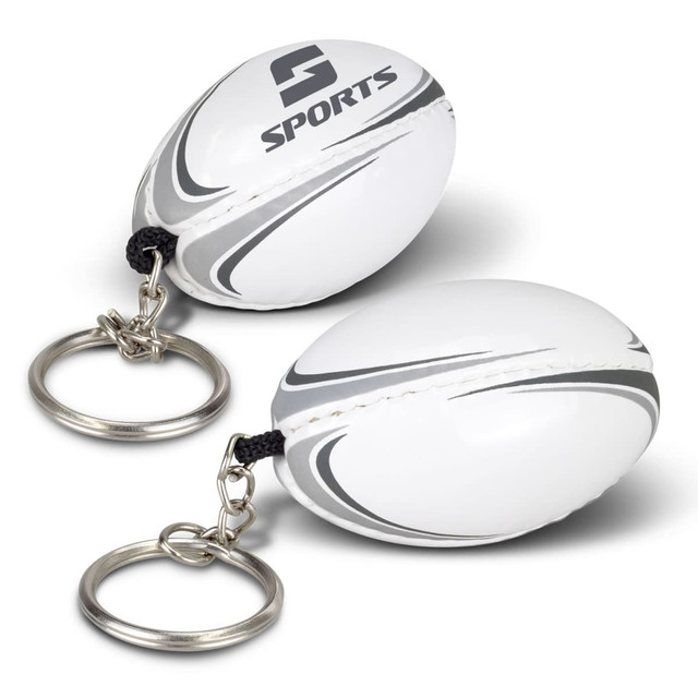 A rugby ball key ring with a white and grey design, featuring a silver keychain attachment. A rugby ball key ring with a white and grey design, featuring a silver keychain attachment.