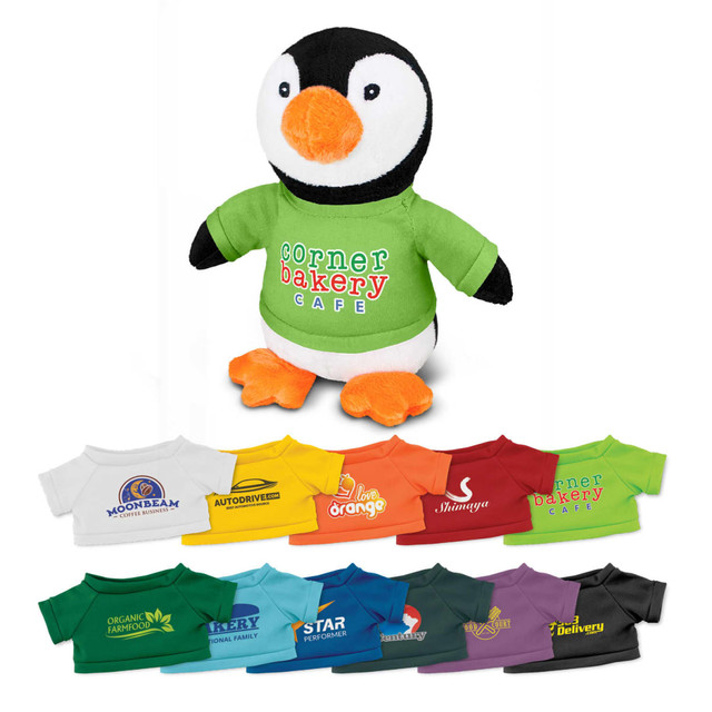 A black and white penguin plush toy wearing a green shirt. Various colourful toy shirts are displayed below.