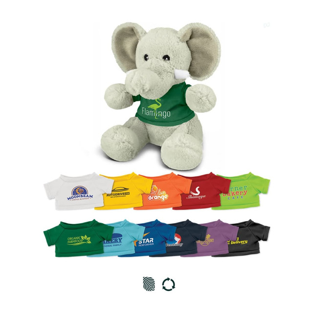 A plush grey elephant wearing a green shirt, accompanied by various colourful t-shirts in a row below.