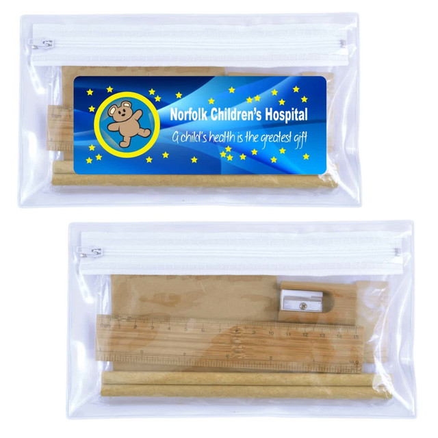 A clear zip pouch containing a ruler, sharpener, and pencil, with a colourful branding label attached. A clear zip pouch containing a ruler, sharpener, and pencil, with a colourful branding label attached.