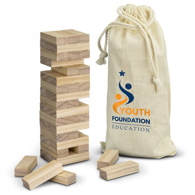 A wooden Mini Tumbling Tower set with stacking blocks and a canvas bag featuring a logo. A wooden Mini Tumbling Tower set with stacking blocks and a canvas bag featuring a logo.
