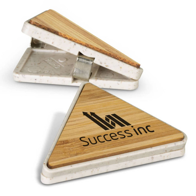 A triangular bamboo clip in natural tones with a logo, featuring a white base.