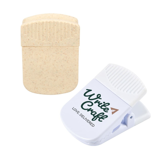 A white and beige Croc Magnetic Clip featuring a logo on the white clip and a textured beige design. A white and beige Croc Magnetic Clip featuring a logo on the white clip and a textured beige design.