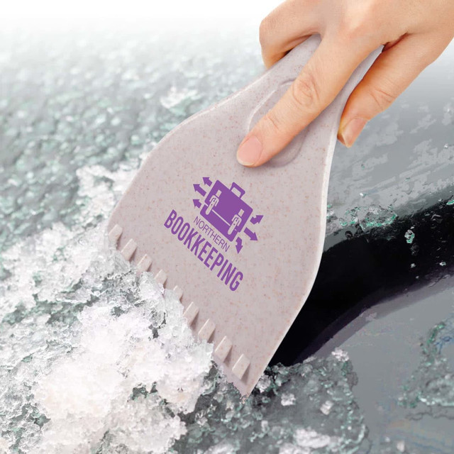 A grey eco ice scraper with a textured handle removing ice from a car windscreen, featuring a logo. A grey eco ice scraper with a textured handle removing ice from a car windscreen, featuring a logo.