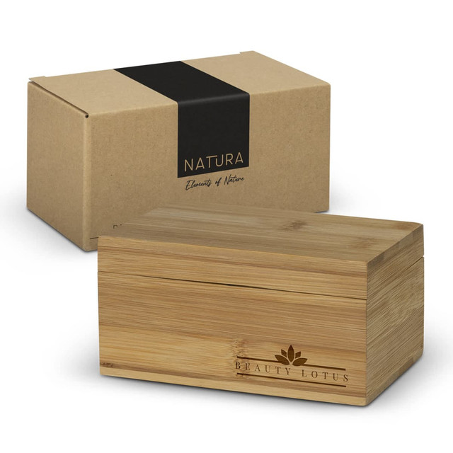 A bamboo tea box with a wooden finish, packaged in a cardboard box with a black band and logo. A bamboo tea box with a wooden finish, packaged in a cardboard box with a black band and logo.