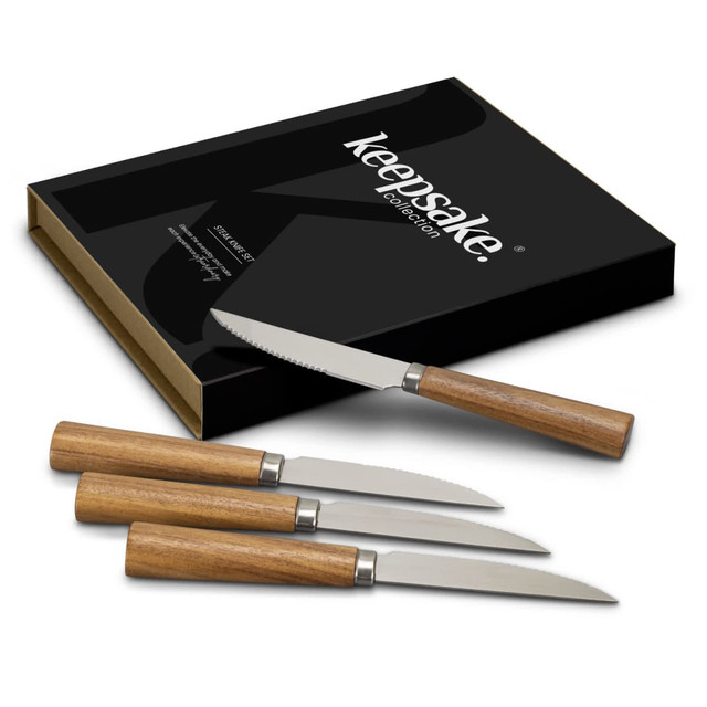 A knife set featuring four stainless steel knives with wooden handles, presented in a sleek black box with branding. A knife set featuring four stainless steel knives with wooden handles, presented in a sleek black box with branding.