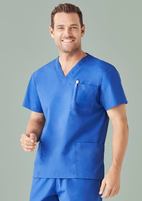 A blue unisex scrub top with a V-neck and a chest pocket, featuring a logo on the chest. A blue unisex scrub top with a V-neck and a chest pocket, featuring a logo on the chest.