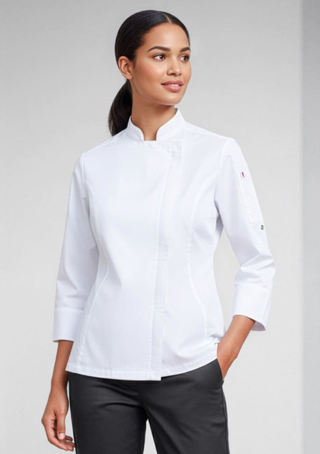 A white long sleeve chef jacket worn by a woman, featuring a stylish collar and a logo on the sleeve.