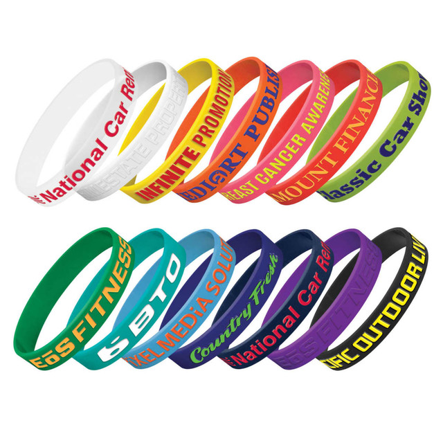A collection of silicone wristbands in various colours, featuring embossed text. Some include logos or branding elements. A collection of silicone wristbands in various colours, featuring embossed text. Some include logos or branding elements.