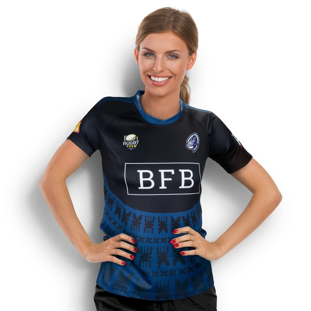 A woman wearing a navy blue custom performance rugby T-shirt with a logo and graphic design. A woman wearing a navy blue custom performance rugby T-shirt with a logo and graphic design.