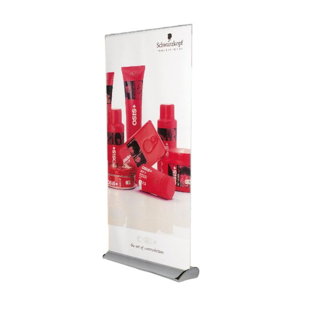 A pull-up banner displaying various hair care products in red packaging, featuring a logo at the top. A pull-up banner displaying various hair care products in red packaging, featuring a logo at the top.