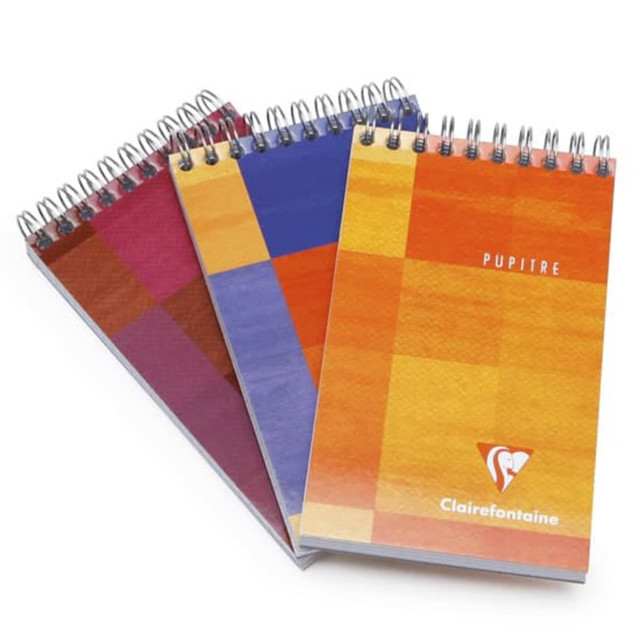 A7 wiro bound notebooks in vibrant orange, blue, and burgundy colours, featuring a logo on the front cover. A7 wiro bound notebooks in vibrant orange, blue, and burgundy colours, featuring a logo on the front cover.