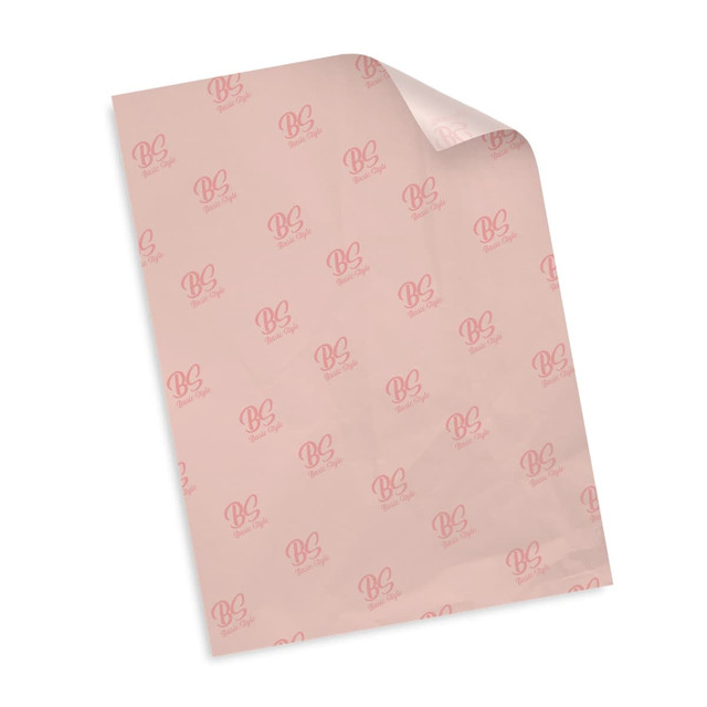 A piece of pale pink tissue paper featuring a repeated logo pattern. The paper is slightly curled at one corner. A piece of pale pink tissue paper featuring a repeated logo pattern. The paper is slightly curled at one corner.