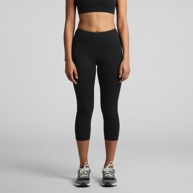 Active mid-leg leggings in black, featuring a form-fitting design and a high waist. Includes branding on the waistband.