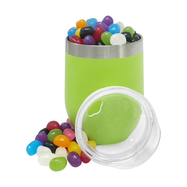 A green reusable coffee cup filled with colourful jelly beans, beside a clear jar also filled with jelly beans. A green reusable coffee cup filled with colourful jelly beans, beside a clear jar also filled with jelly beans.