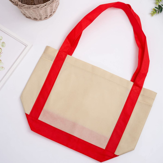 A beige reusable grocery bag with red handles, featuring a logo. Ideal for shopping or carrying items.