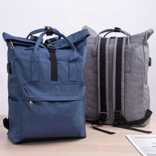 Two laptop backpacks are displayed: one in navy blue and the other in grey, featuring adjustable straps and front pockets.