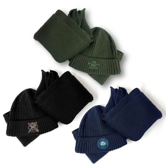 A set of knitted beanies in dark green, black, and navy, featuring various logos. A set of knitted beanies in dark green, black, and navy, featuring various logos.