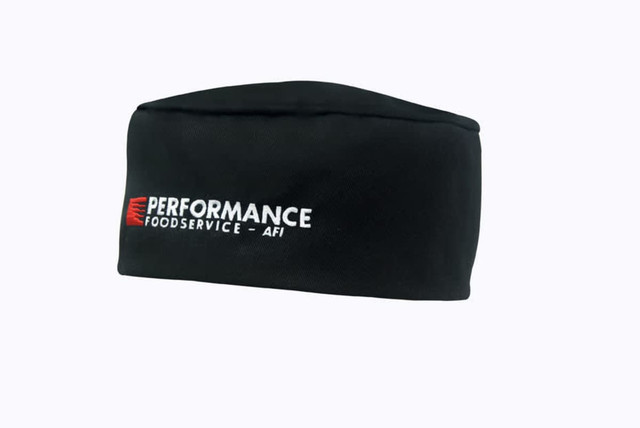 A black poly cotton chef's hat with a branded logo on one side.