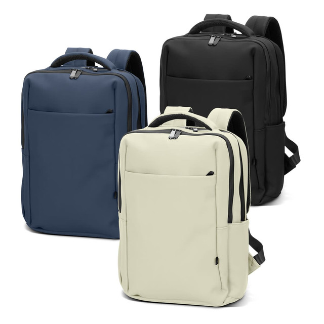 A soft-touch daily backpack in navy, black, and cream, featuring multiple compartments and a logo. A soft-touch daily backpack in navy, black, and cream, featuring multiple compartments and a logo.